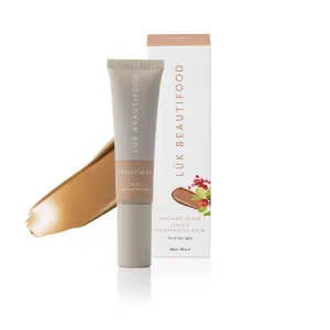 Instant Glow Skin Tint: Nude 6 - Tan